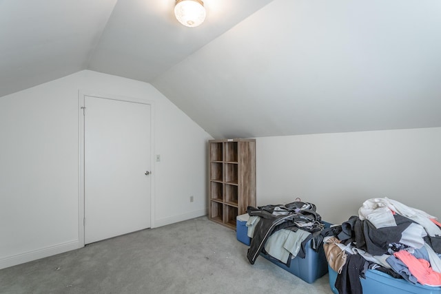 bonus room featuring carpet and vaulted ceiling