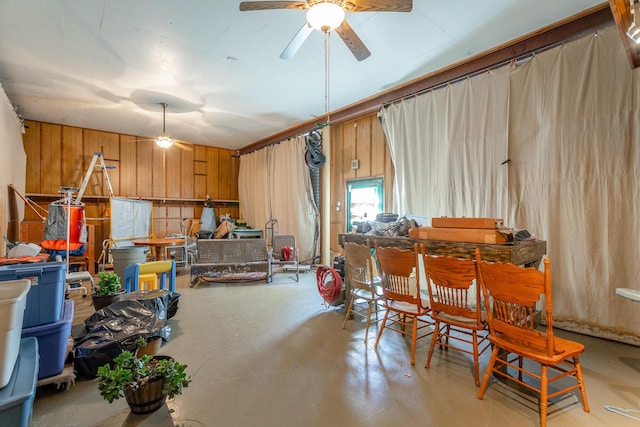 miscellaneous room featuring wooden walls