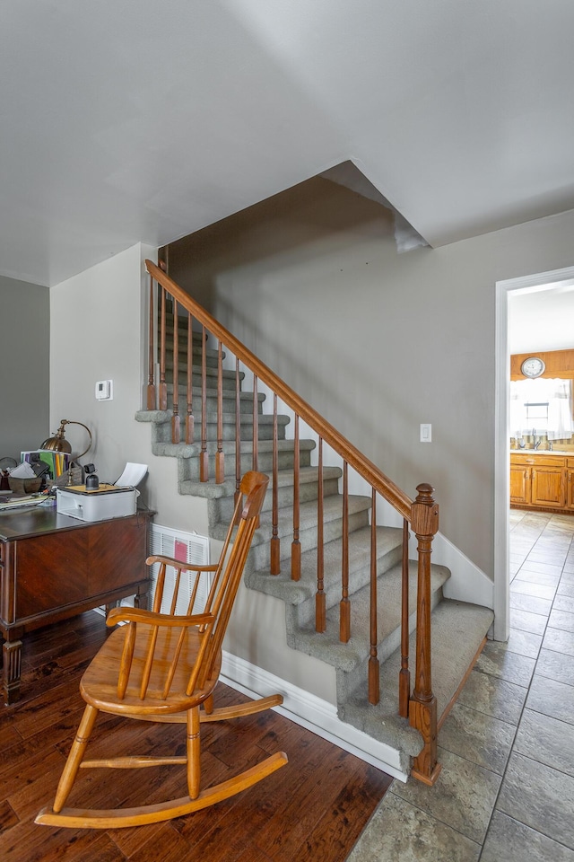 staircase with sink