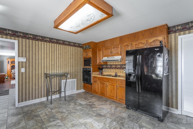 kitchen featuring black appliances