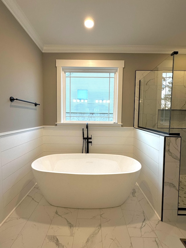 bathroom featuring separate shower and tub and ornamental molding