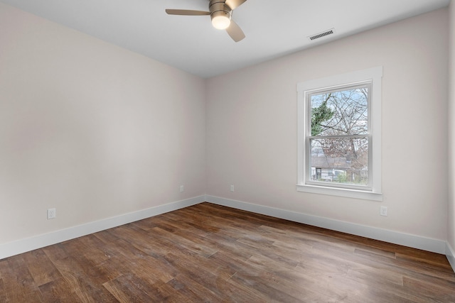 unfurnished room featuring ceiling fan and hardwood / wood-style floors