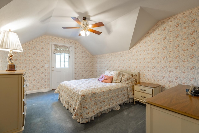 carpeted bedroom featuring ceiling fan and lofted ceiling