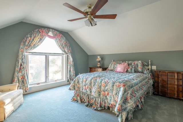 carpeted bedroom featuring multiple windows, vaulted ceiling, and ceiling fan