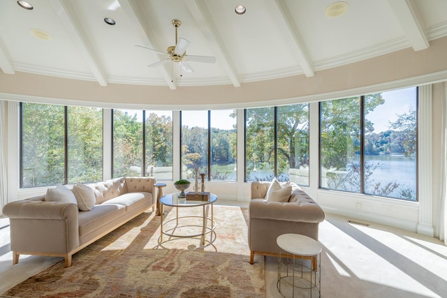 sunroom with beamed ceiling and ceiling fan