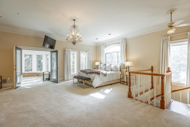 carpeted bedroom featuring a notable chandelier, crown molding, and multiple windows