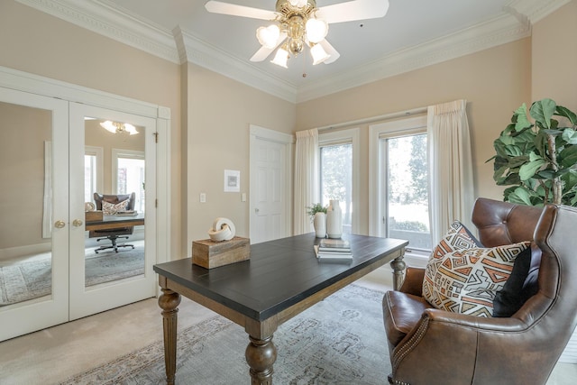 office area featuring carpet flooring, ceiling fan, crown molding, and french doors