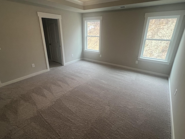 empty room with light colored carpet