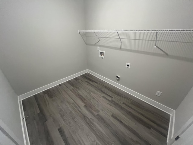 laundry room featuring electric dryer hookup, washer hookup, and dark hardwood / wood-style floors