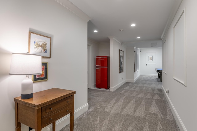 hallway featuring recessed lighting, baseboards, carpet floors, and ornamental molding