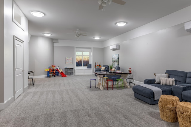 rec room with baseboards, carpet, a ceiling fan, and a wall mounted AC