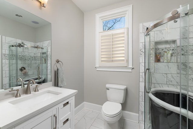 bathroom featuring baseboards, toilet, a stall shower, marble finish floor, and vanity