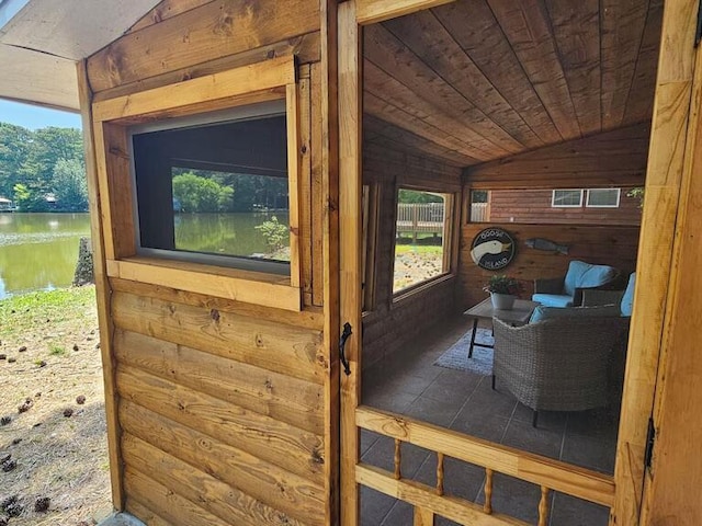 view of stable featuring a water view