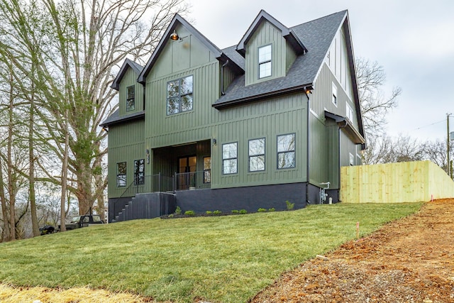 view of front of home with a front lawn