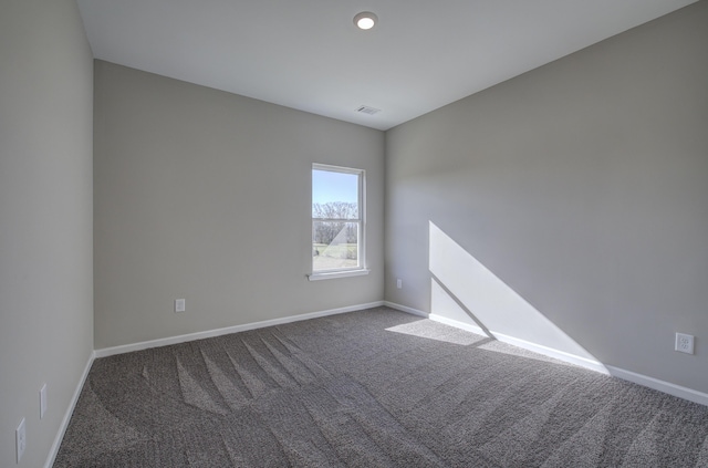 spare room with carpet flooring