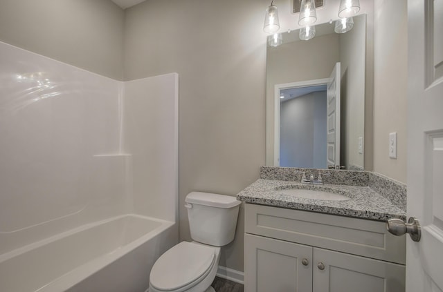 full bathroom with shower / washtub combination, vanity, and toilet