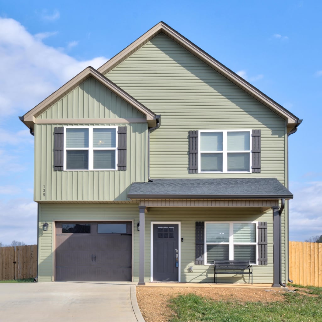 view of front of property with a garage