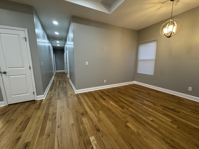 empty room with wood-type flooring