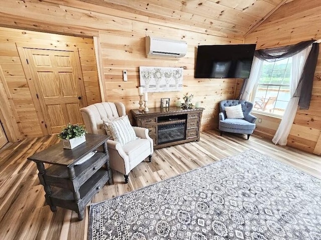 living area with wood ceiling, wood-type flooring, an AC wall unit, lofted ceiling, and wood walls