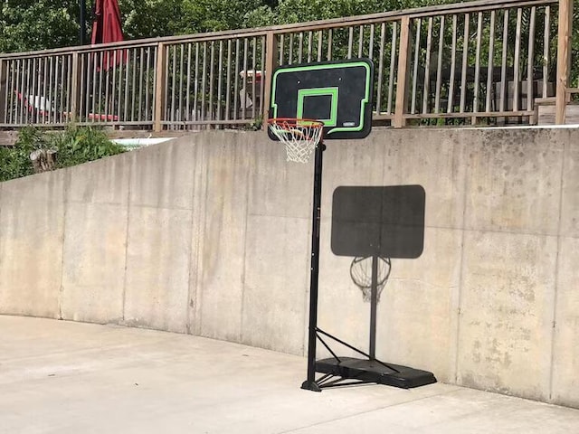 view of patio with basketball hoop