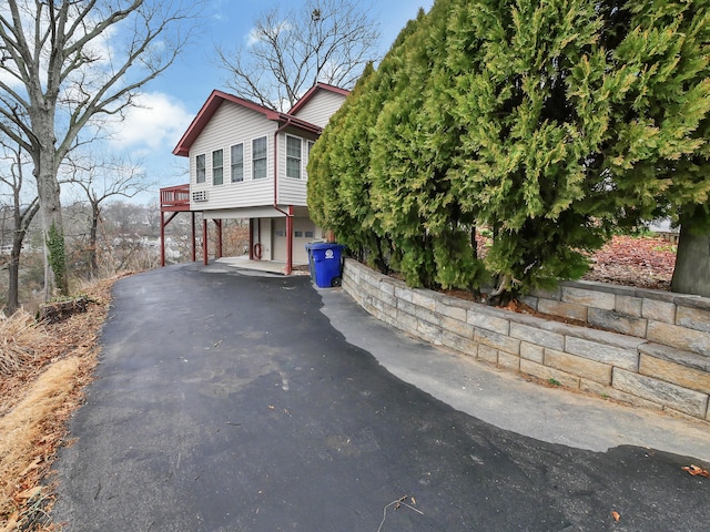 view of front of property with a carport