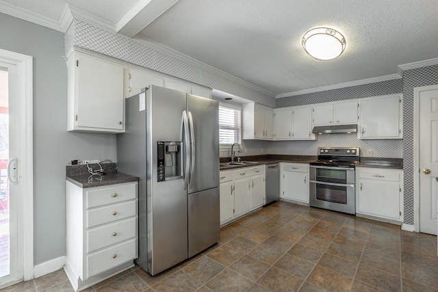 kitchen featuring crown molding, sink, white cabinetry, and stainless steel appliances