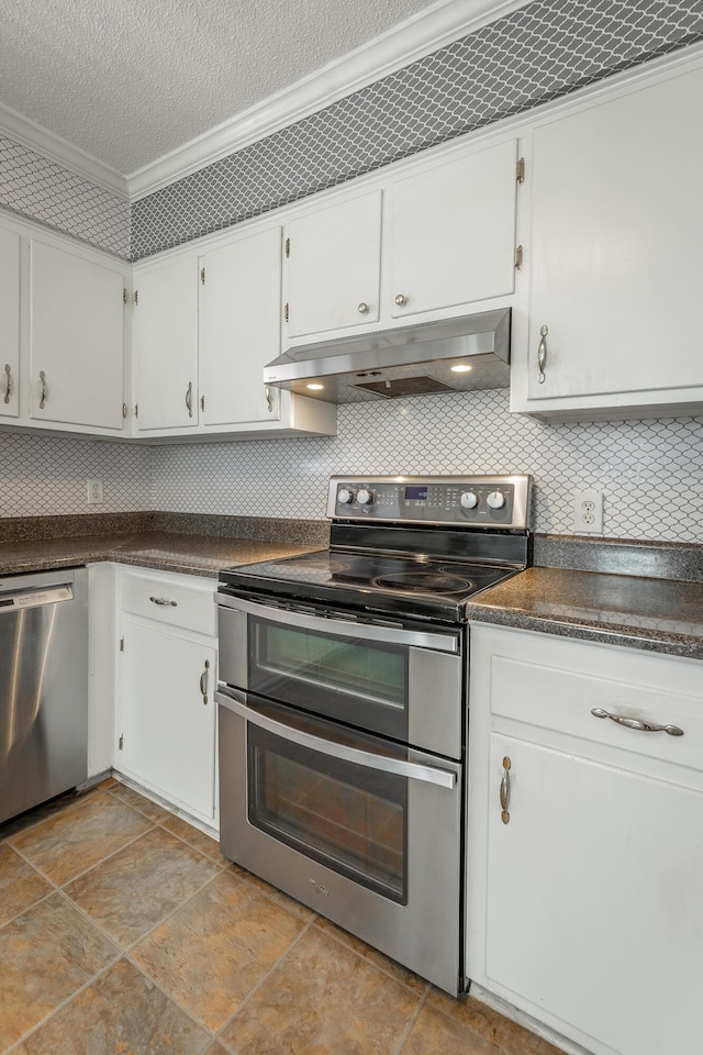 kitchen with white cabinetry, crown molding, appliances with stainless steel finishes, and tasteful backsplash