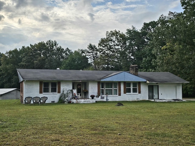 ranch-style house with a front lawn