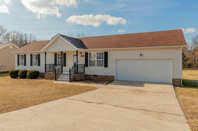 ranch-style house featuring a front yard and a garage