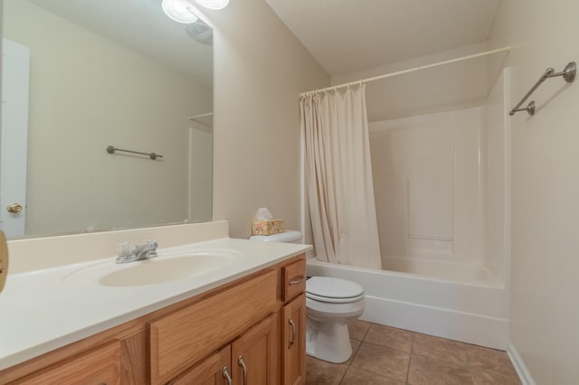 full bathroom featuring toilet, vanity, tile patterned floors, and shower / tub combo with curtain