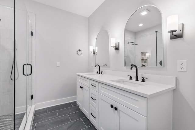 bathroom with vanity and walk in shower