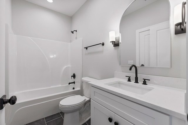 full bathroom featuring bathtub / shower combination, vanity, tile patterned floors, and toilet