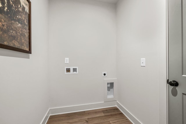 laundry area with hookup for an electric dryer, washer hookup, and hardwood / wood-style flooring