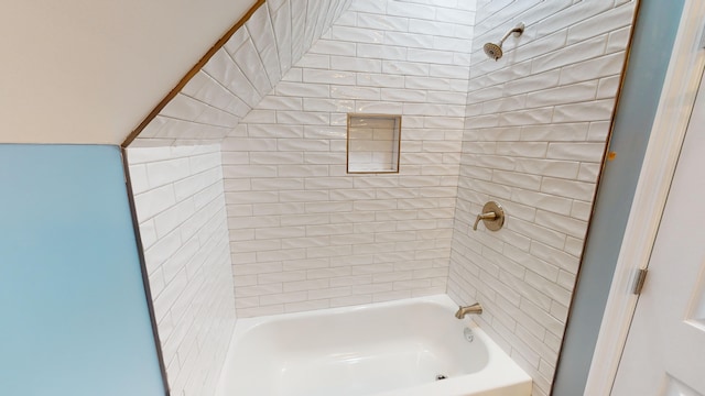 bathroom with tiled shower / bath combo