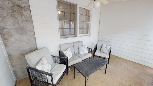 view of patio featuring ceiling fan