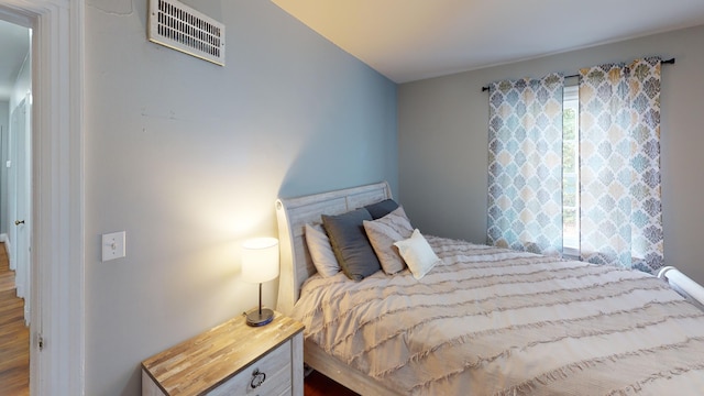 bedroom featuring multiple windows