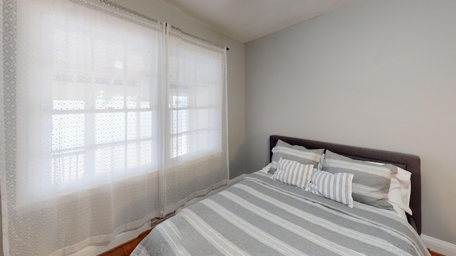 bedroom featuring wood-type flooring