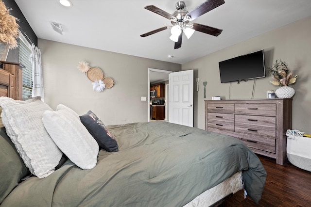 bedroom featuring ceiling fan and wood finished floors