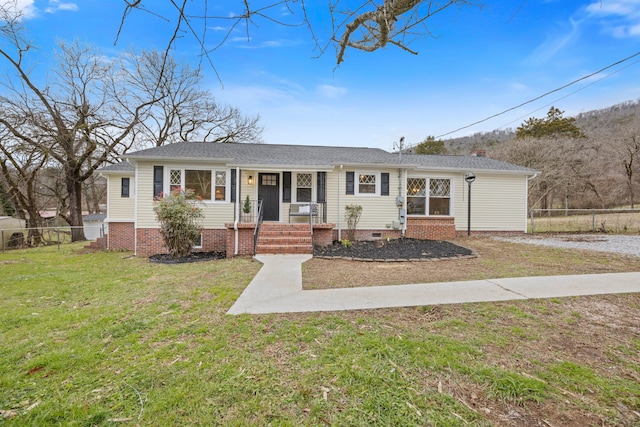 view of front facade with a front yard and a porch