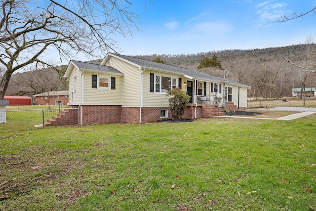 view of front of property with a front lawn