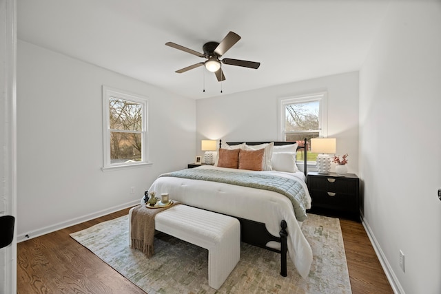 bedroom with hardwood / wood-style flooring and ceiling fan