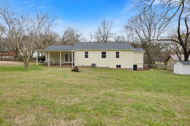 back of house with a yard, a patio, and central AC unit