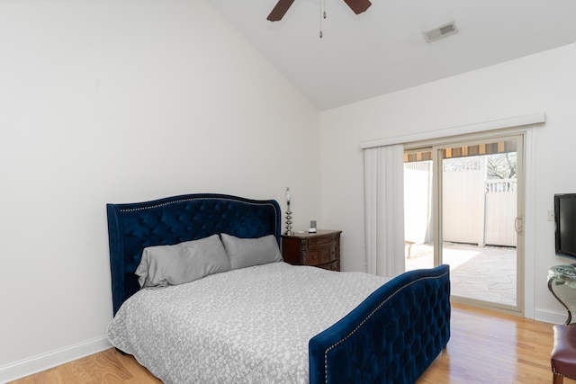 bedroom featuring lofted ceiling, ceiling fan, and wood-type flooring