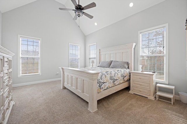 bedroom featuring ceiling fan, light colored carpet, and high vaulted ceiling