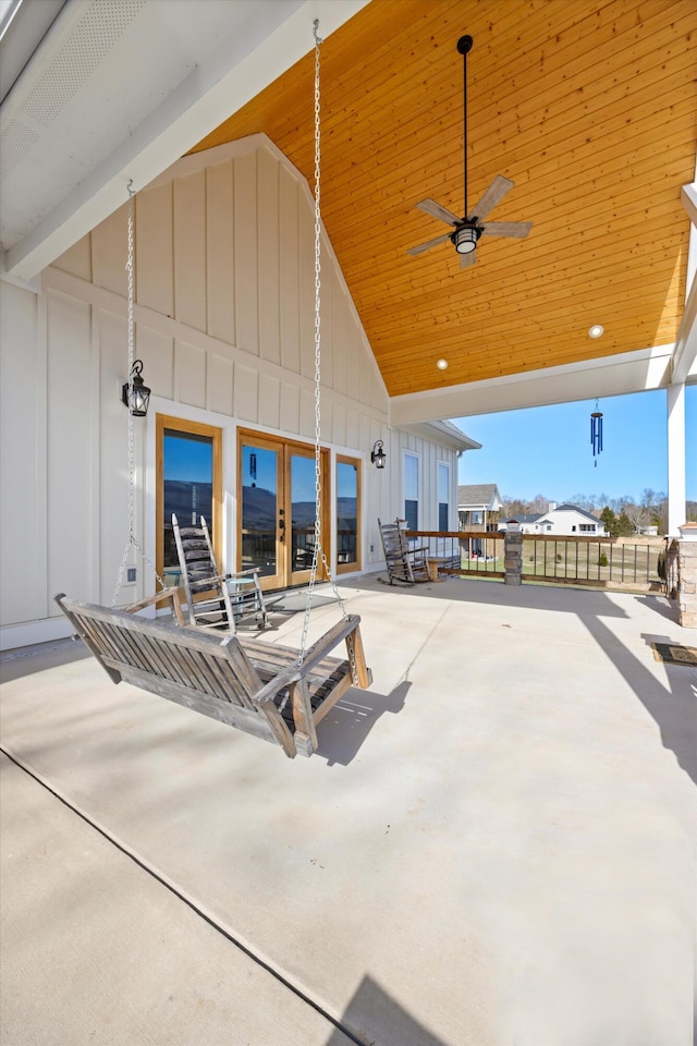 view of patio featuring ceiling fan