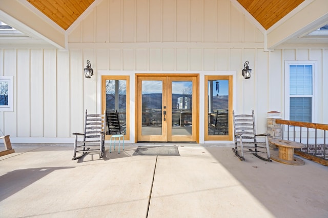 entrance to property featuring french doors and a patio