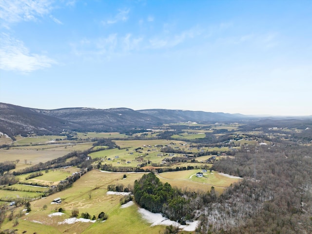 drone / aerial view featuring a rural view and a mountain view