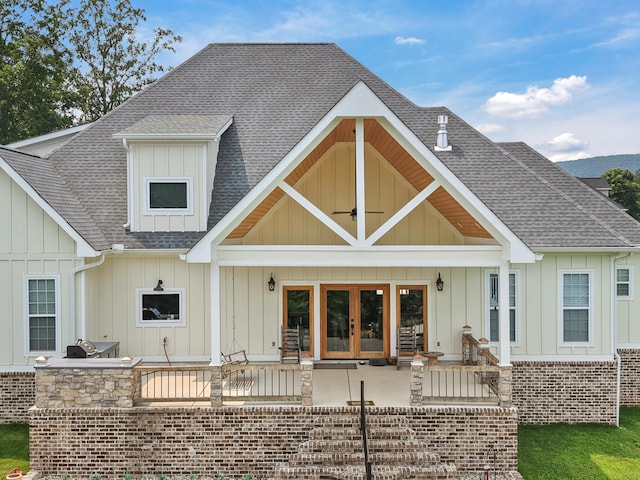 300 Skyhigh Dr, Dunlap, TN 37327 - rear view of house with board and batten siding, french doors, roof with shingles, and exterior kitchen