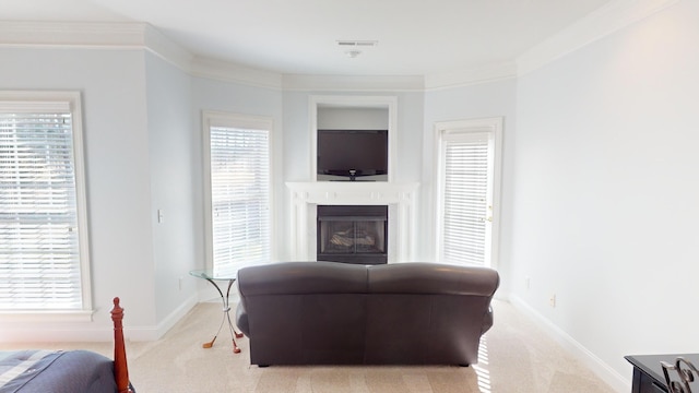 living room with light carpet, a wealth of natural light, and crown molding