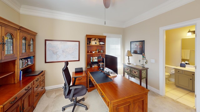 home office with ceiling fan, light colored carpet, and ornamental molding